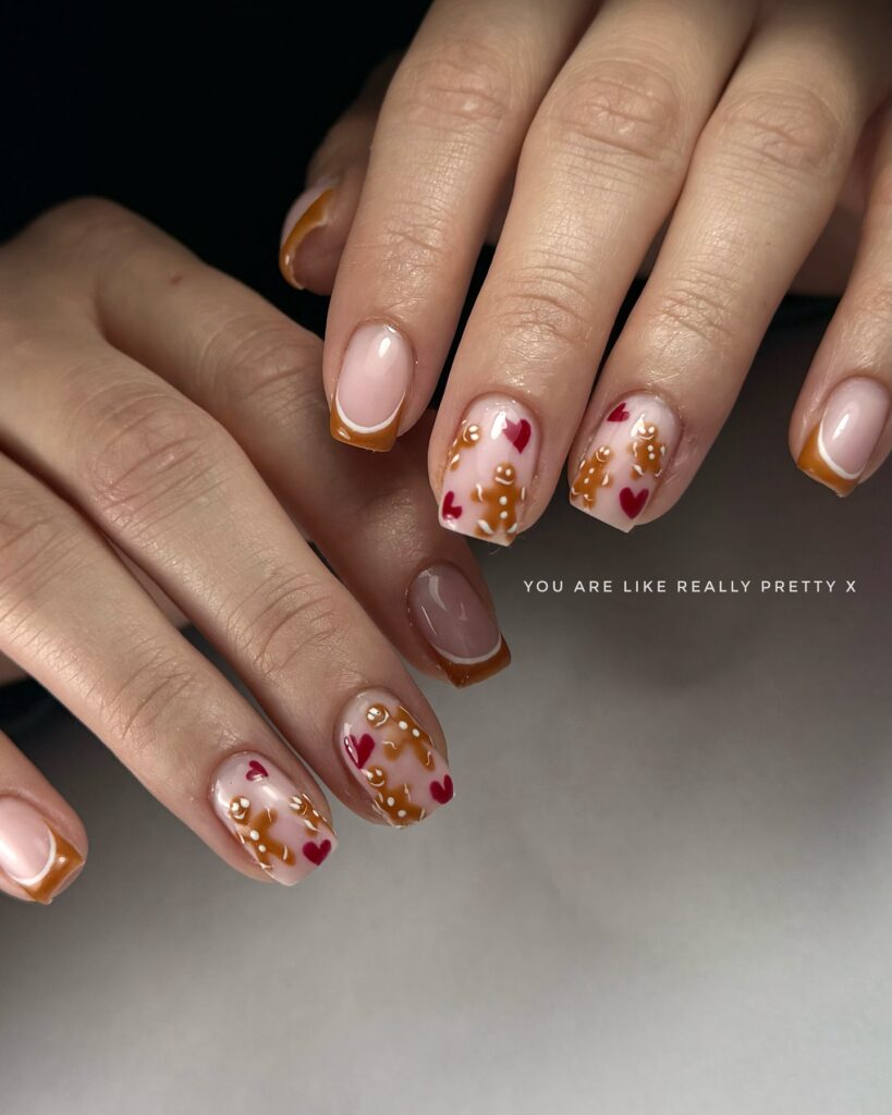 Gingerbread nail art με χριστουγεννιάτικα σχέδια, φιόγκους και μικρά gingerbread